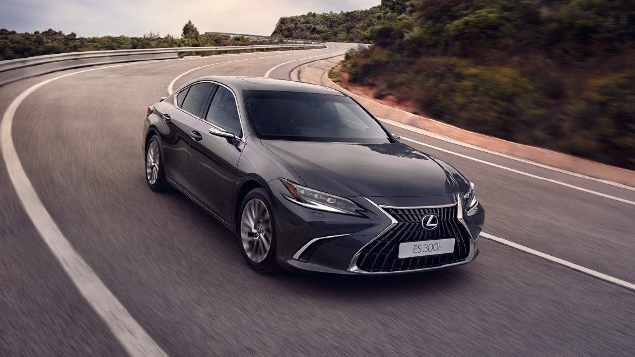 A Lexus ES driving on a road