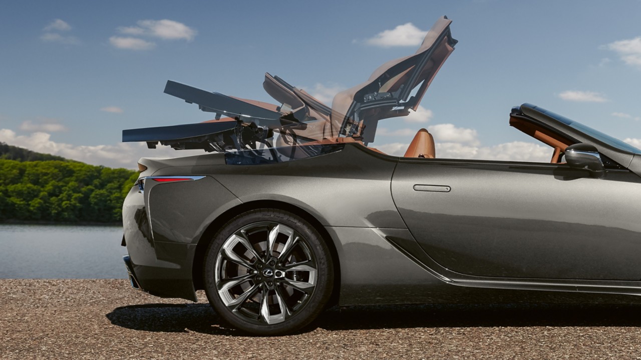 The Lexus LC Convertible's soft top roof in action