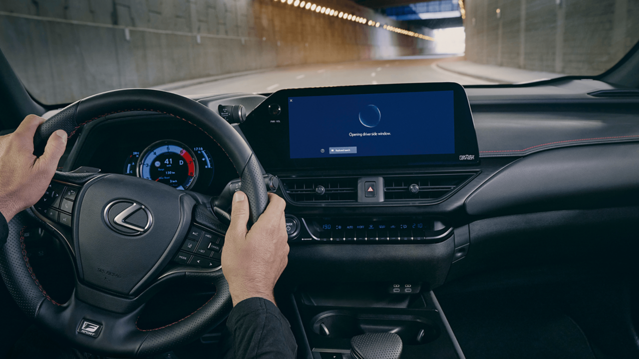  The steering wheel and multimedia display inside a Lexus UX